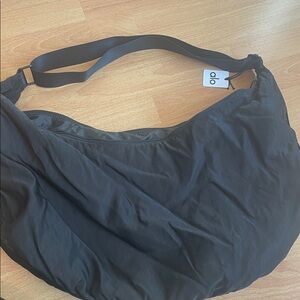 BRAND NEW WITH TAGS Alo Black Yoga Om on the go Sling bag Nylon